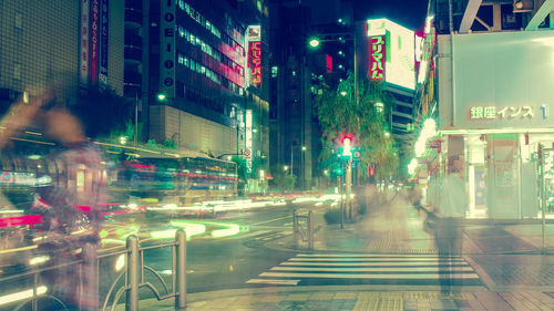 Blurred motion of illuminated street at night