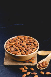 Close-up of sweet food on table against black background