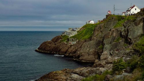 Scenic view of sea against cloudy sky