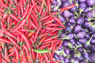 Full frame shot of red chili peppers at market