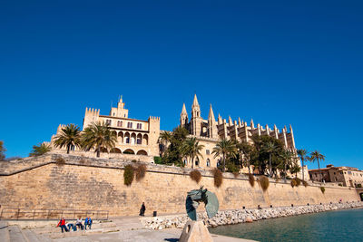 View of historical building against blue sky