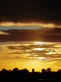 Scenic view of dramatic sky during sunset