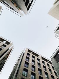 Low angle view of buildings against clear sky