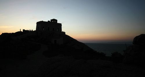 Scenic view of sea against sky at sunset