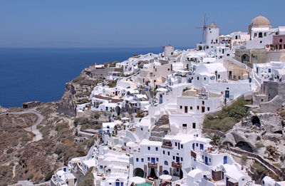 High angle view of town by sea