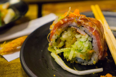 Close-up of sushi in plate on table