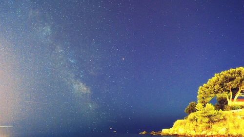 Low angle view of stars in sky at night