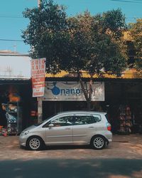 Cars parked on road in city