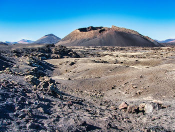 Scenic view of desert against sky