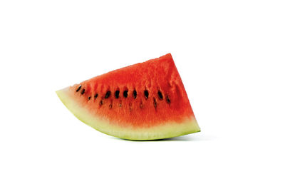 Close-up of fruit against white background