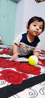 Cute boy sitting at home