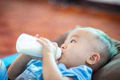 Close-up of cute baby lying down