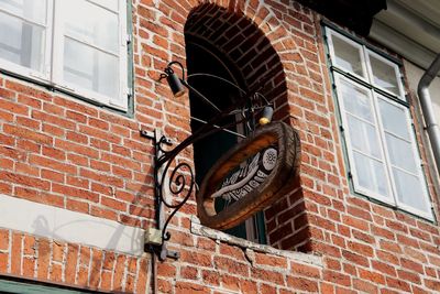 Low angle view of text on building