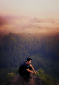 Full length of man on mountain against sky