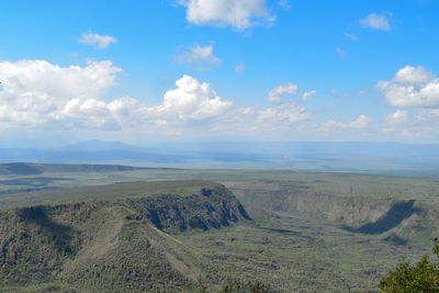 The volcanic crater on mount suswa against the background of mount longonot, rift valley, kenya