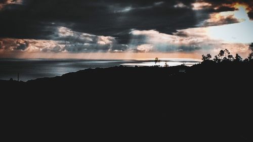 Scenic view of sea against sky at sunset