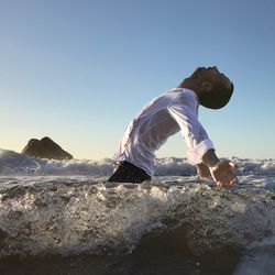 Man against clear sky