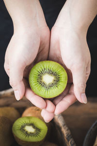 Close-up of hand holding fruit