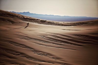 Scenic view of desert against sky