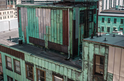 Roof top view of tarnished copper and metal industrial building in boston