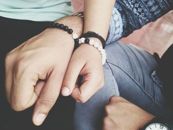 Close-up of couple hands