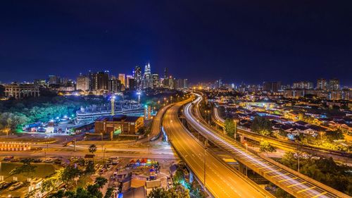 High angle view of light trails on city street