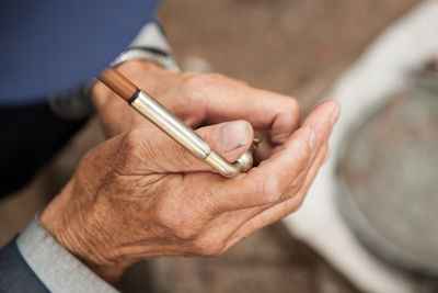 High angle view of man smoking