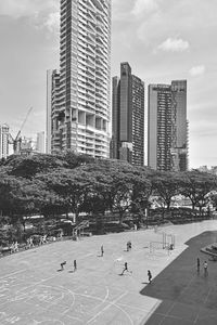 Buildings in city against sky