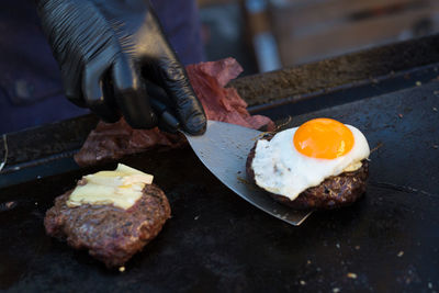 High angle view of man preparing food