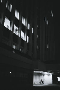 Low angle view of illuminated building at night