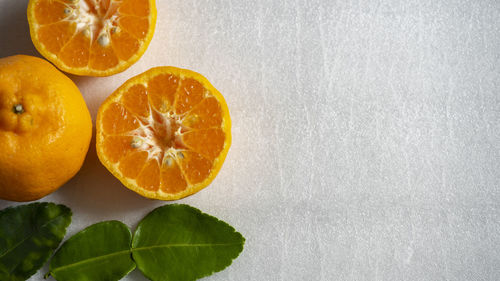 Close-up of oranges on table