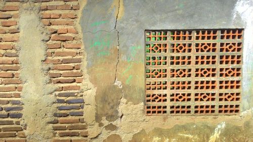 Brick wall with closed door