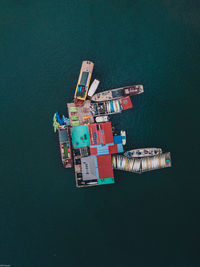High angle view of commercial dock by sea