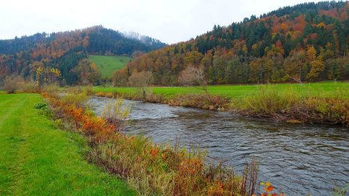 Scenic view of lake against sky during autumn