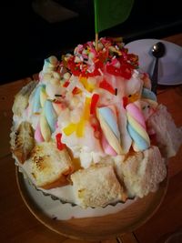 Close-up of cake served on table