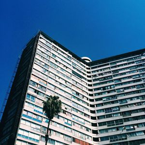 Low angle view of buildings against clear sky