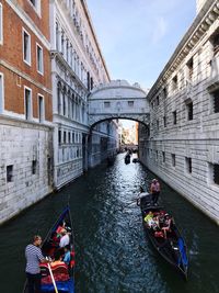 People on boat in canal