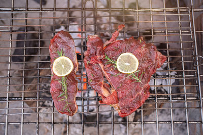 Close-up of meat in cage