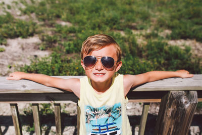 Portrait of smiling boy wearing sunglasses