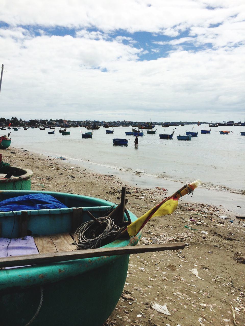 nautical vessel, water, sea, transportation, sky, moored, mode of transport, boat, beach, cloud - sky, shore, sand, cloud, nature, cloudy, day, tranquility, outdoors, no people, blue