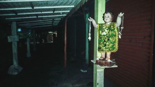 Boy standing in corridor
