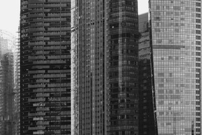 Low angle view of modern buildings against sky