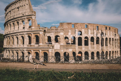 View of old ruins against cloudy sky