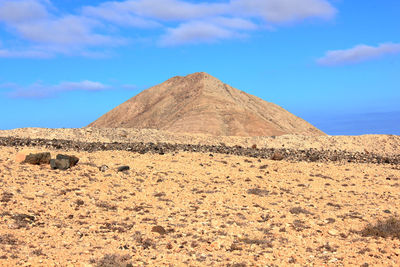 Scenic view of desert against sky