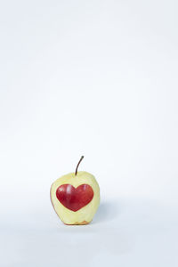 Apple with peel in shape of heart