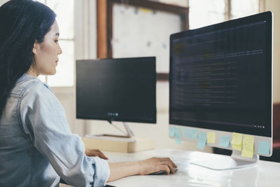 Woman working on table