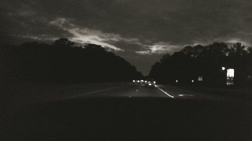 Illuminated road at night