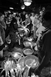 People at market stall