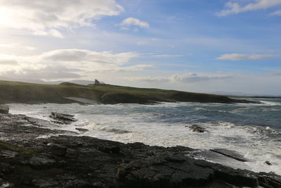 View of sea against cloudy sky