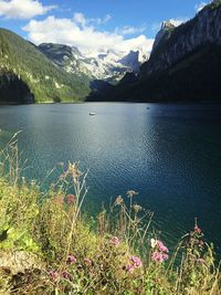 Scenic view of lake with mountains in background
